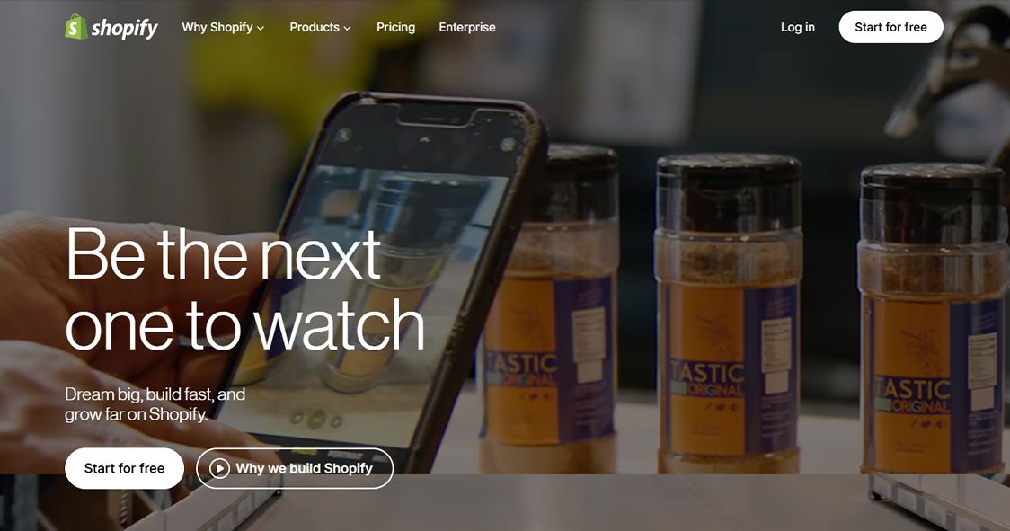 Shopify homepage interface featuring the headline "Be the next one to watch" and "Start for free" call-to-action buttons.